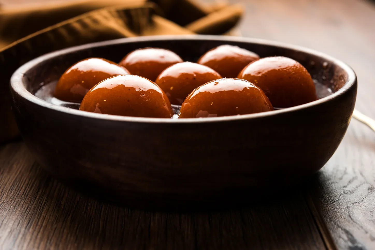 Gulab jamun at Sweet-Chili Authentic Indian Restaurant Edmonton - warm milk dumplings soaked in fragrant sugar syrup
