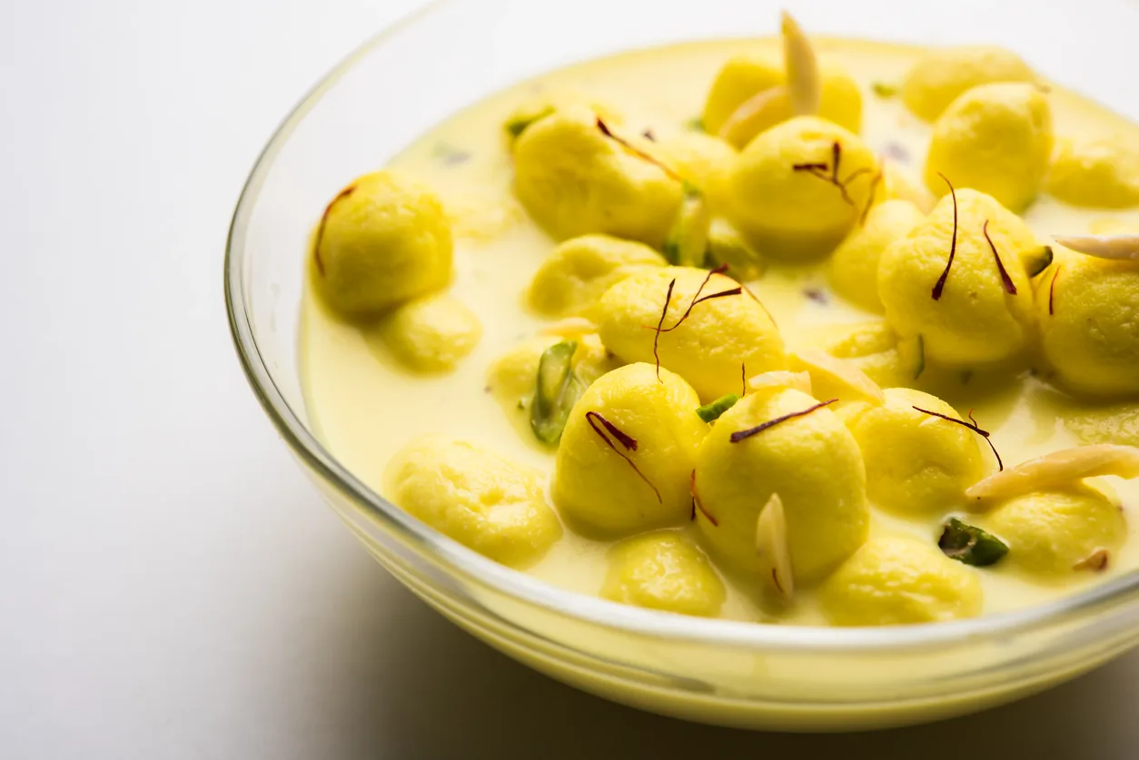 Rasmalai at Sweet-Chili Authentic Indian Restaurant Edmonton - soft paneer discs in saffron-infused sweetened milk